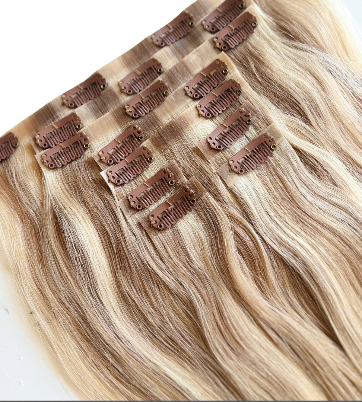 "Seamless clip-in hair extensions by LJM Hair — ultra-thin invisible weft for a natural, undetectable finish"